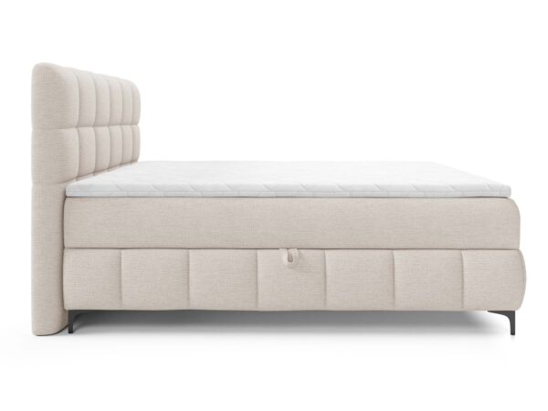 Tapicerowane łóżko kontynentalne beżowe z pikowanym zagłówkiem na metalowych nóżkach