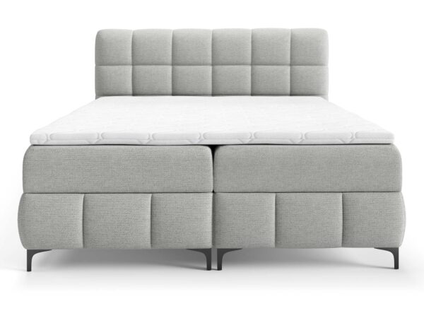 Tapicerowane łóżko kontynentalne jasnoszare z pikowanym zagłówkiem