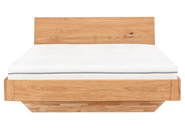 Łóżko drewniane dębowe z masywnym zagłówkiem i ramą