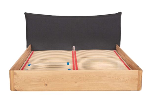 Nowoczesne łóżko dębowe z tapicerowanym zagłówkiem w kolorze grafitowym